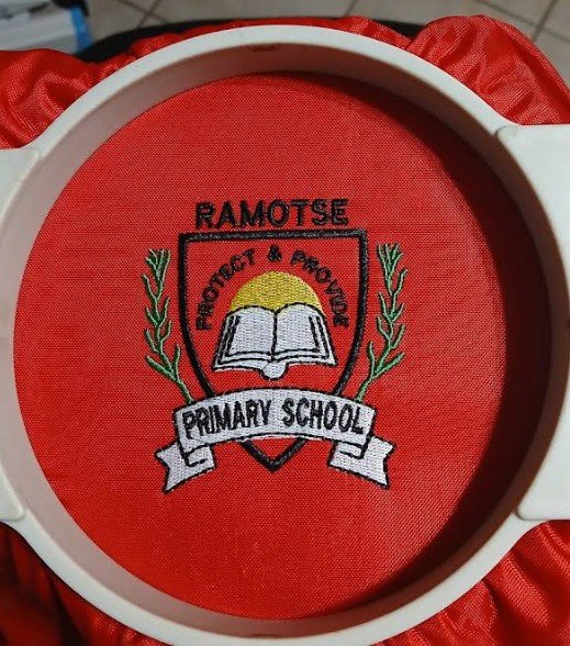 Ramotse Primary School crest embroidered in a hoop